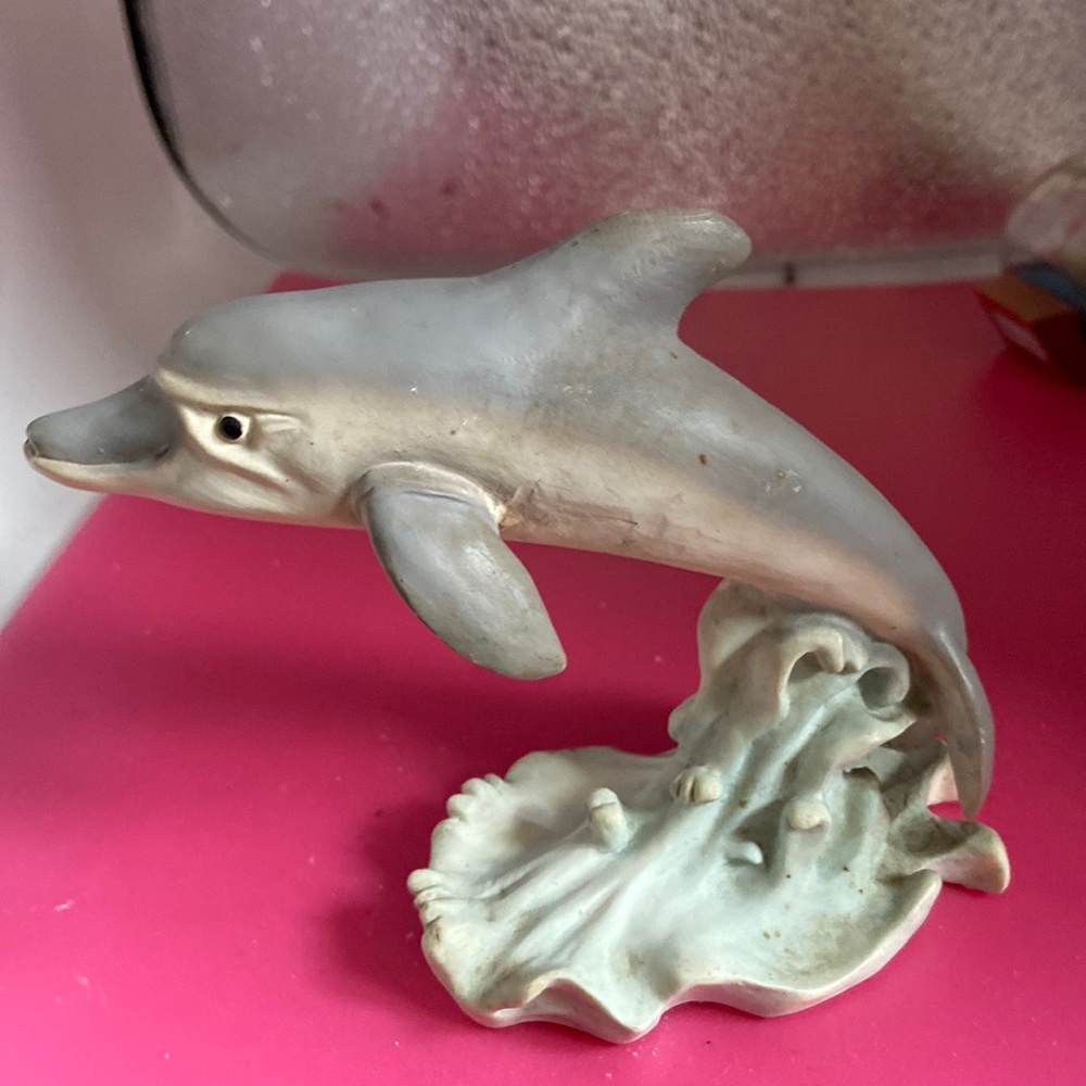 Dolphin leaping on a wave He’s smiling! 4.5” tall& 4.5” wide waves-light blue